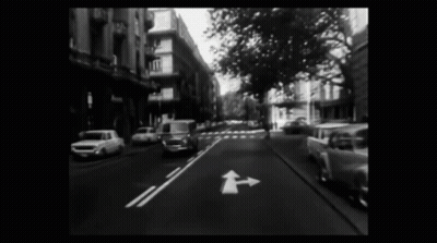Black And White City Street With Van GIF