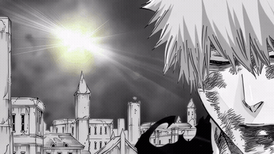 Black And White City With Sun Shining Through Buildings GIF
