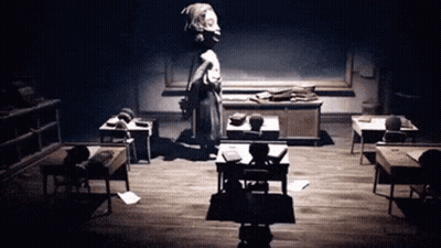 Black And White Classroom With Woman Standing GIF