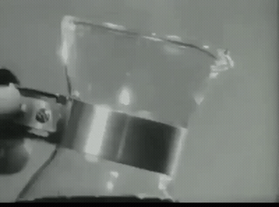 Black And White Coffee Cup With Steam And Spoon GIF