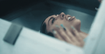 Black And White Coffin With Hand Sticking Out GIF
