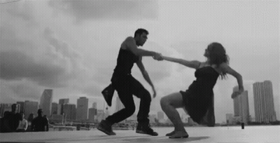 Black And White Couple Dancing On Rooftop GIF