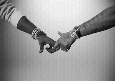 Black And White Couple Holding Hands GIF