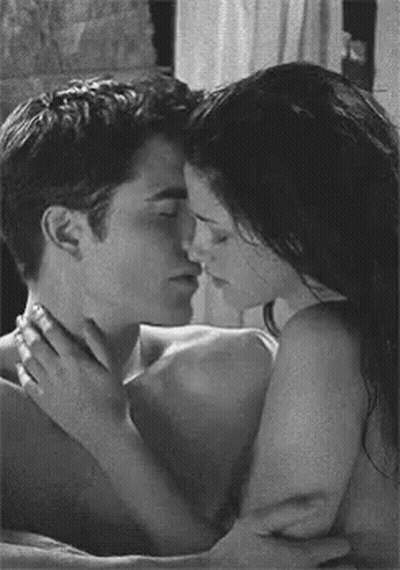 Black and White Couple Kissing in Bathtub