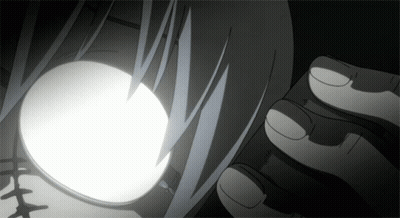 Black And White Drawing Of Face With Glowing Eye GIF