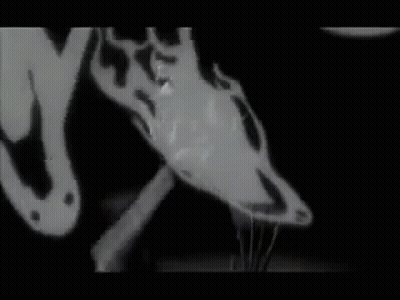 Black And White Drawing Of Man And Woman Kissing GIF