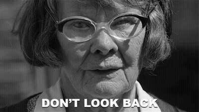 Black And White Elderly Woman With Glasses Don't Look Back GIF