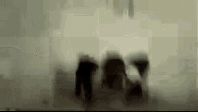 Black And White Face Behind Glass GIF