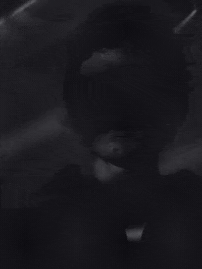 Black And White Face In The Dark GIF
