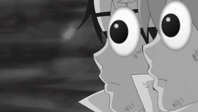 Black And White Face With Large Eyes GIF