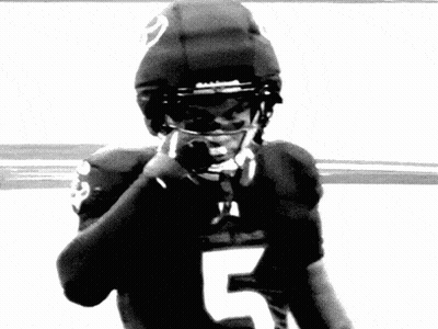 Black And White Football Player Number 5 GIF