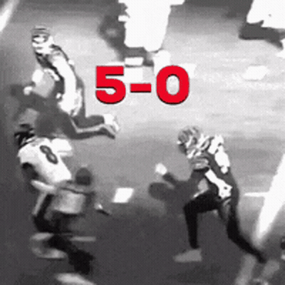 Black And White Football Players Score 5-0 GIF