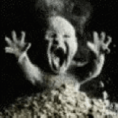 Black And White Ghost Screaming From Popcorn GIF