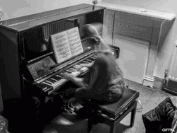 Black And White Girl Playing Piano GIF