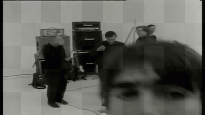 Black And White Group Of Men With Amps GIF