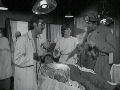 Black And White Group Talking To Patient GIF
