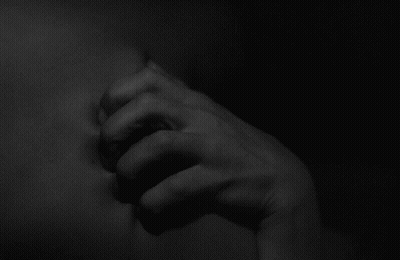 Black And White Hand In Dark GIF