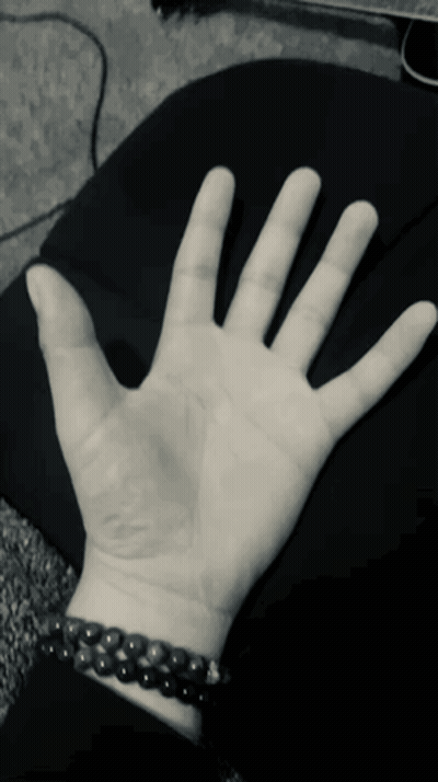 Black And White Hand With Bracelet GIF