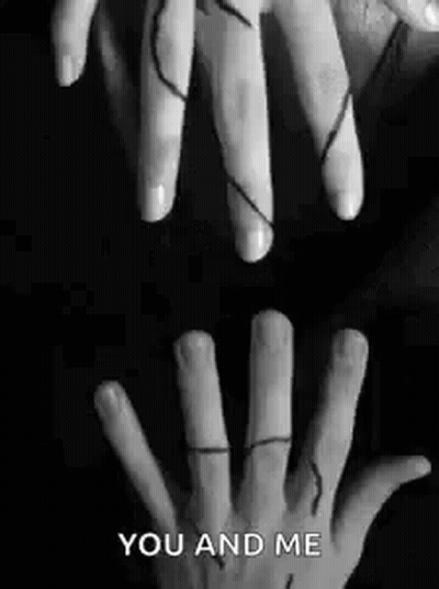 Black And White Hands Holding With String GIF