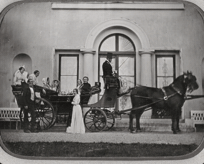 Black And White Horse Drawn Carriage With People GIF