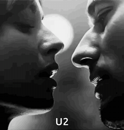 Black And White Man And Woman Kissing GIF
