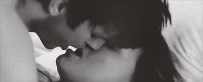 Black And White Man And Woman Kissing GIF