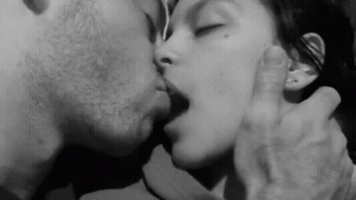 Black And White Man And Woman Kissing GIF