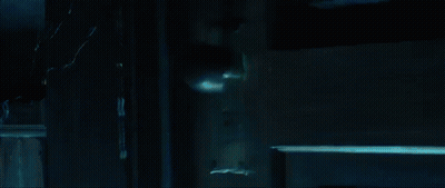 Black And White Man And Woman Laying On Ground GIF