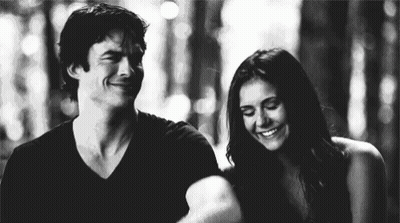 Black And White Man And Woman Smiling GIF