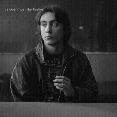 Black And White Man At Table La Guarimba Film Festival GIF