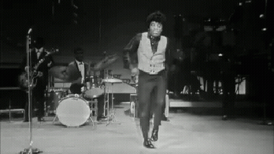 Black And White Man Dancing On Stage GIF