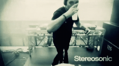 Black And White Man Drinking From Cup With Stereosonic GIF