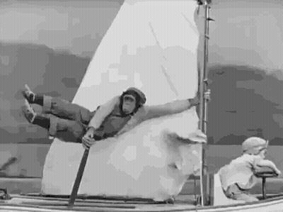 Black And White Man Flying On Boat GIF