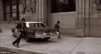 Black and White Man Getting Out of Car
