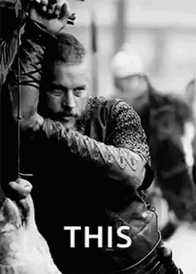 Black And White Man Holding Bow And Arrow Saying This GIF