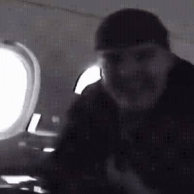 Black And White Man Holding Gun GIF