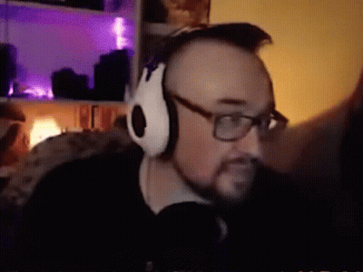 Black And White Man Holding Gun In White Hoodie GIF