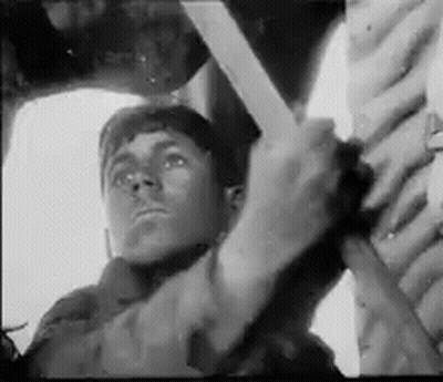 Black And White Man Holding Stick GIF