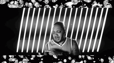 Black And White Man In Basketball Jersey Pointing GIF