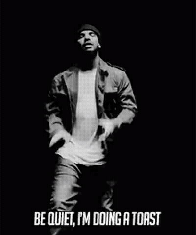 Black And White Man In Beanie Jacket Mic GIF