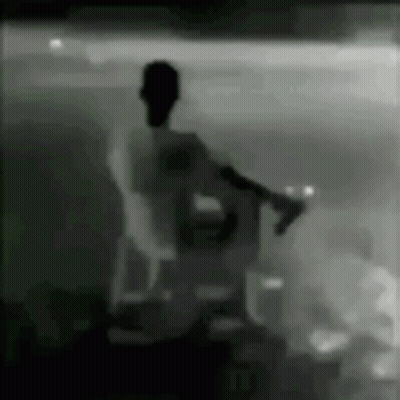 Black And White Man In Chair GIF