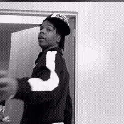 Black And White Man In Hat And Jacket GIF