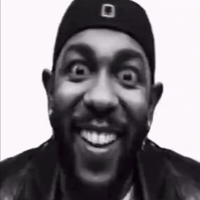 Black And White Man In Hat And Jacket Making Funny Face GIF