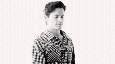 Black And White Man In Hat And Plaid Shirt GIF