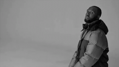 Black And White Man In Puffer Jacket GIF