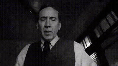 Black And White Man In Suit And Tie With Woman GIF