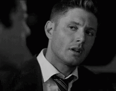 Black and White Man in Suit Making Funny Face