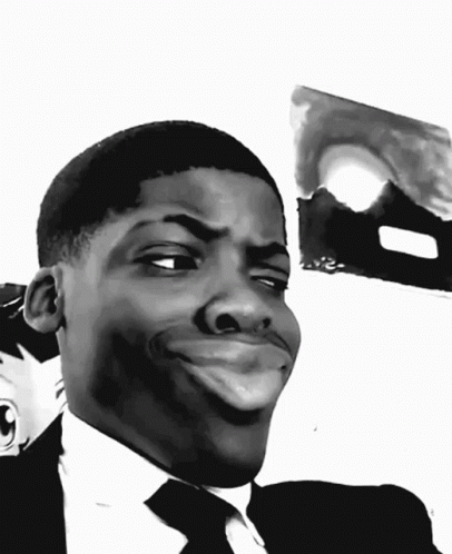 Black And White Man In Suit Making Funny Face GIF