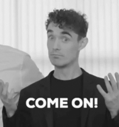 Black and White Man in Suit Saying Come On