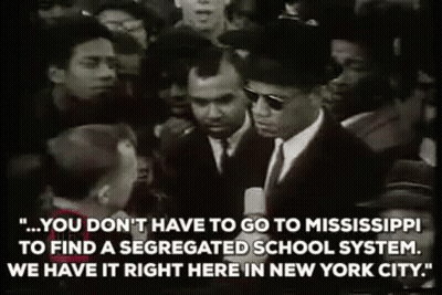 Black And White Man In Suit Talking To Crowd GIF